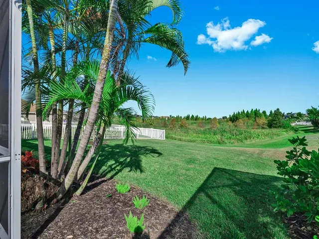 a view of a yard with an outdoor space