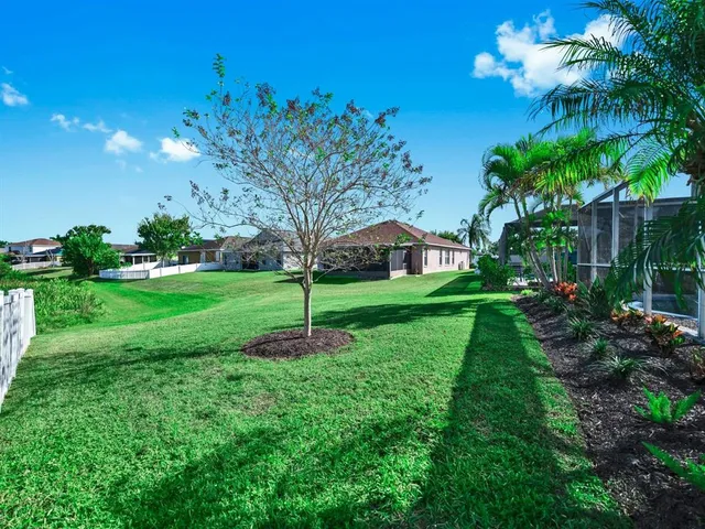 a view of a garden with a fountain