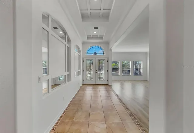 a view of a hallway with windows