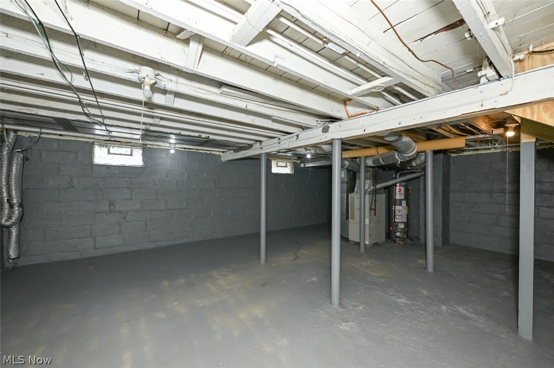 77 West Mildred Avenue Akron, OH 44310 - Photo 39 of 40 Below grade area with heating unit and gas water heater