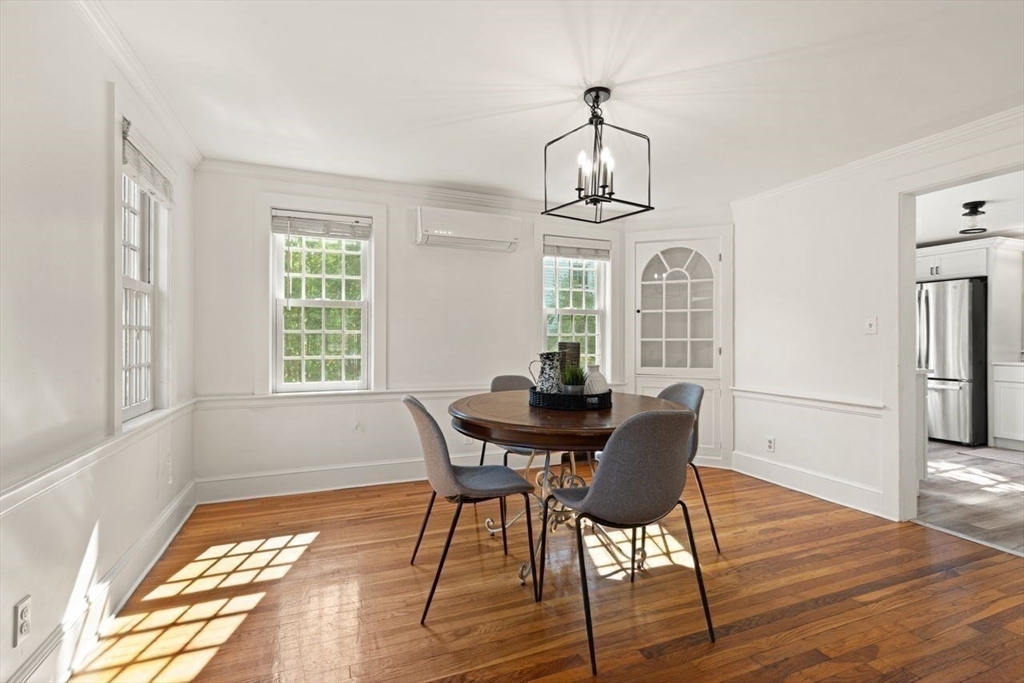 54 Depot Street Sharon, MA 02067 - Photo 15 of 33 a view of a dining room with furniture window and wooden floor