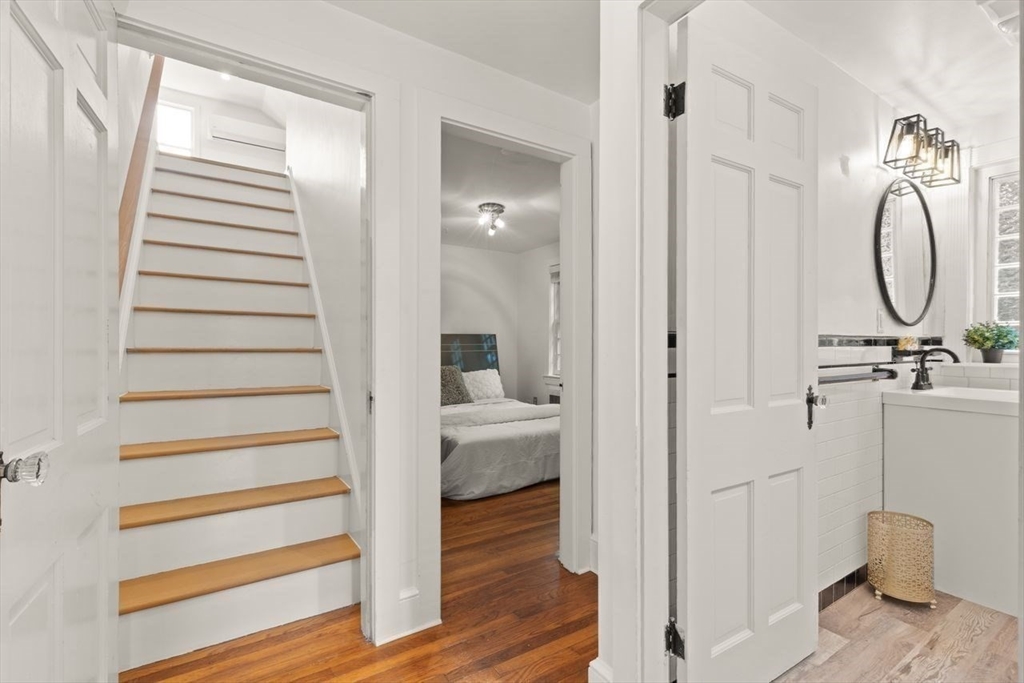 54 Depot Street Sharon, MA 02067 - Photo 23 of 33 a bathroom with a sink and a mirror