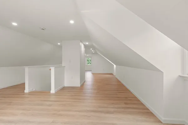 a view of a hallway with an empty room