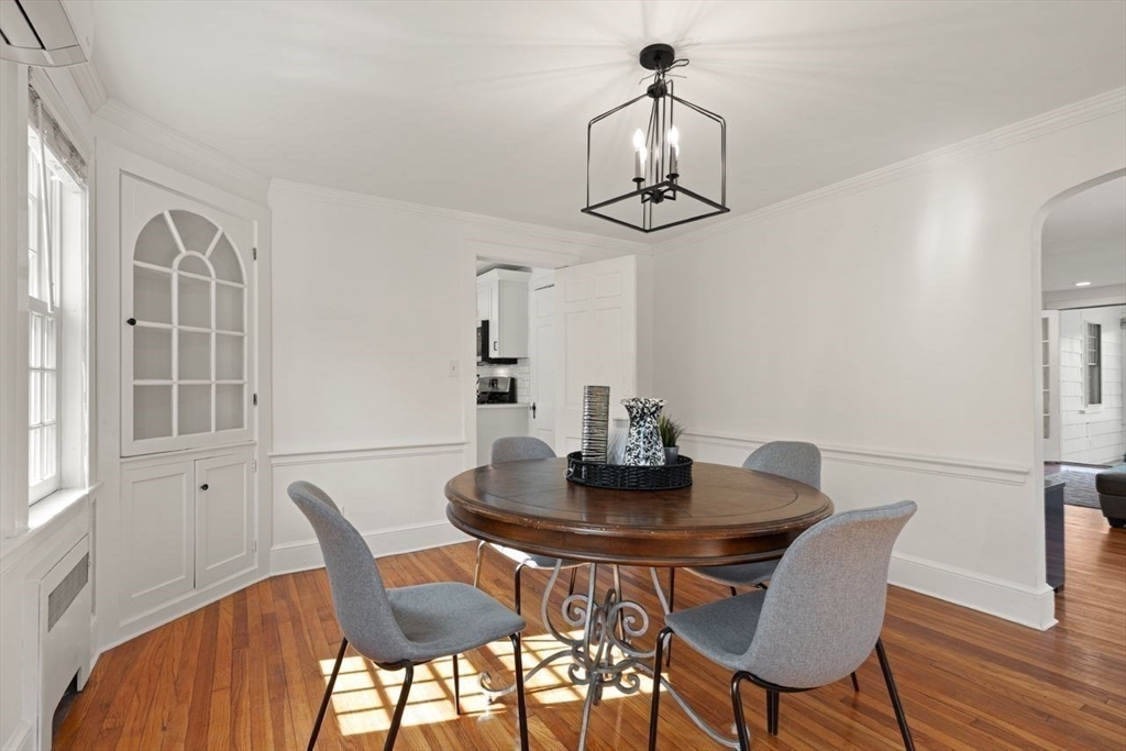 54 Depot Street Sharon, MA 02067 - Photo 7 of 33 a view of a dining room with furniture and wooden floor