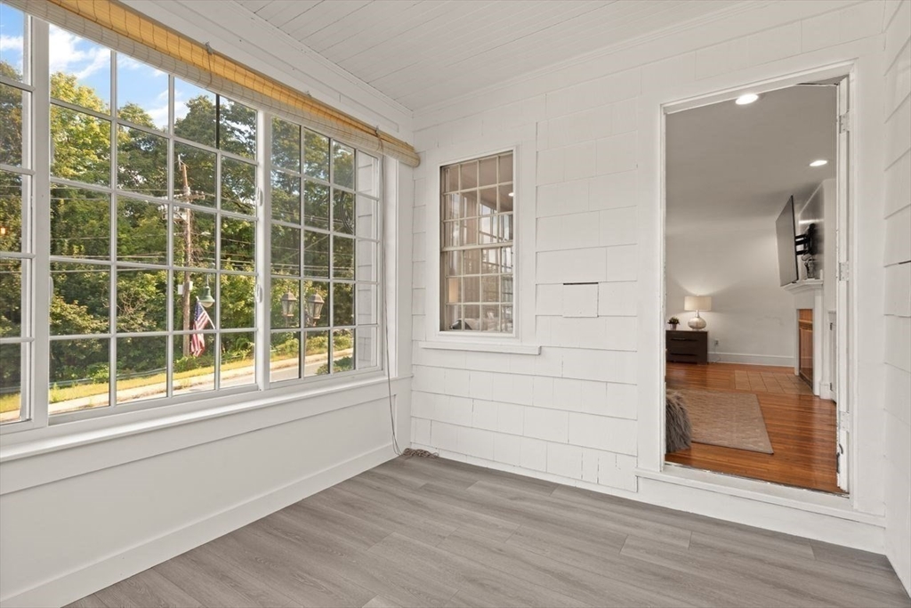 54 Depot Street Sharon, MA 02067 - Photo 10 of 33 a view of empty room with wooden floor and fan