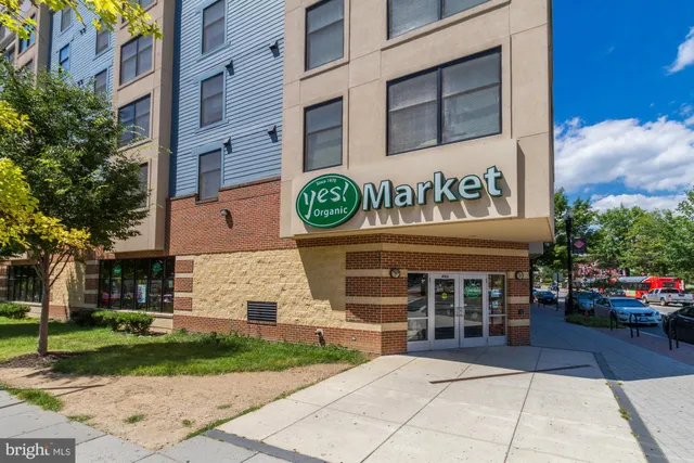 a view of a building with a entrance gate