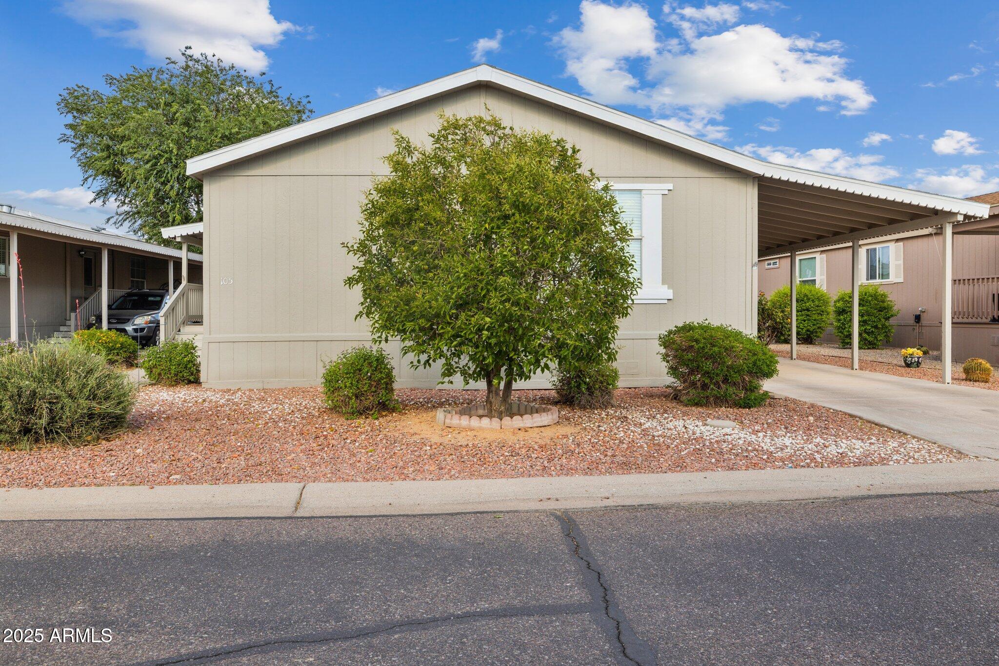 3901 East Pinnacle Peak Road, Unit 105 Phoenix, AZ 85050 - Photo 3 of 23 a house with a outdoor space