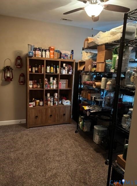 19890 River Road Courtland, VA 23837 - Photo 19 of 32 a room with lots of books and a wooden floor