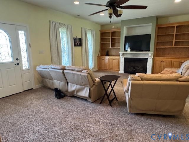 19890 River Road Courtland, VA 23837 - Photo 4 of 32 a living room with furniture and a flat screen tv