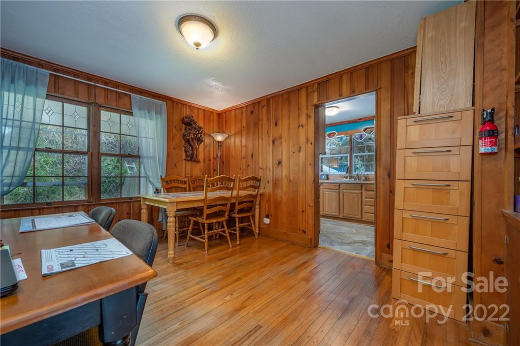 2226 Us Highway Tryon, NC 28782 - Photo 13 of 33 a living room with furniture and wooden floor