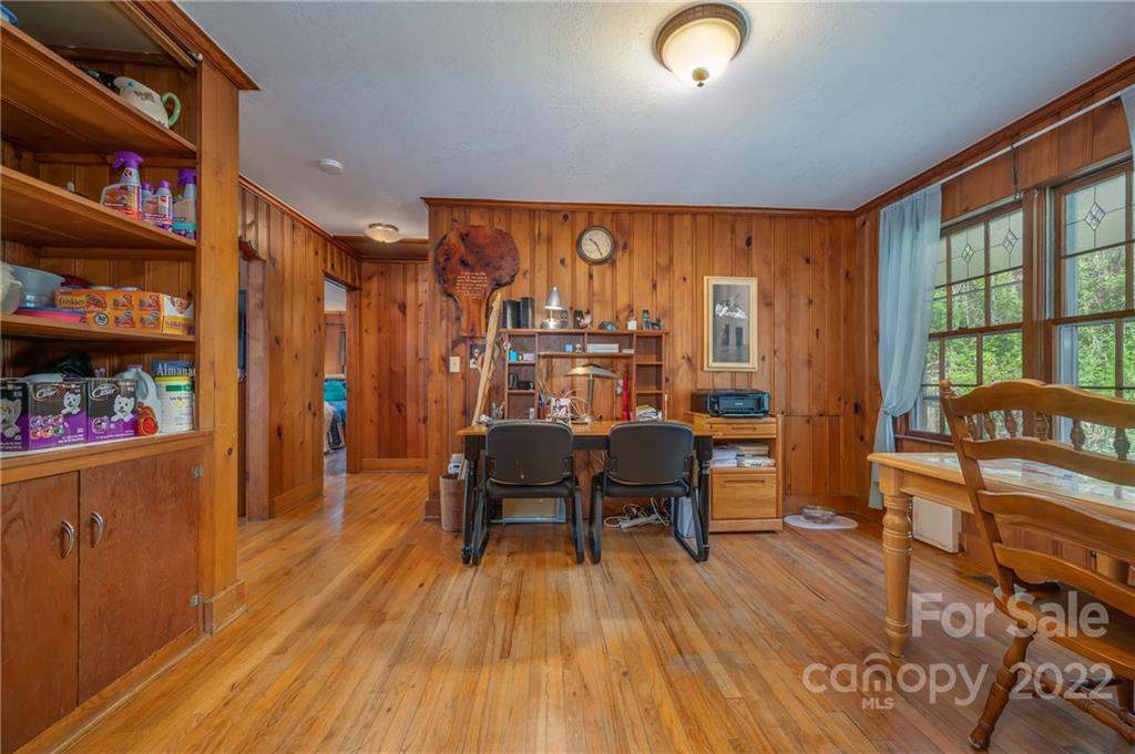 2226 Us Highway Tryon, NC 28782 - Photo 14 of 33 a view of a livingroom with furniture window and wooden floor