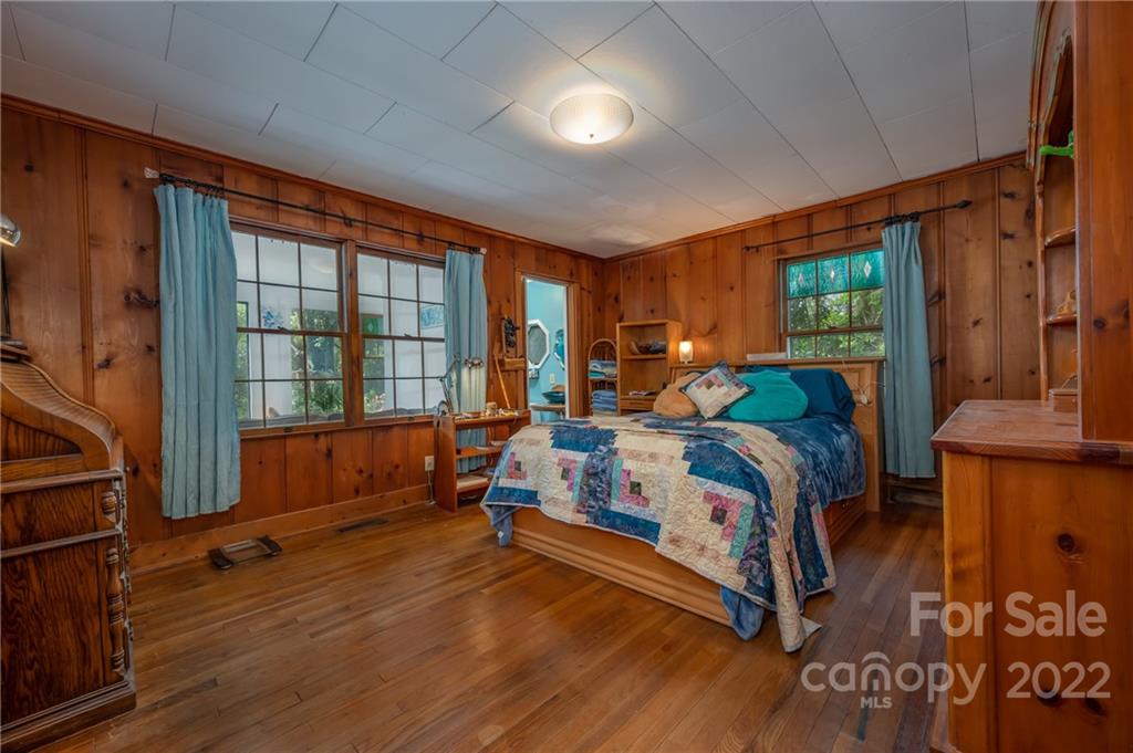 2226 Us Highway Tryon, NC 28782 - Photo 17 of 33 a bed room with a bed and a large window