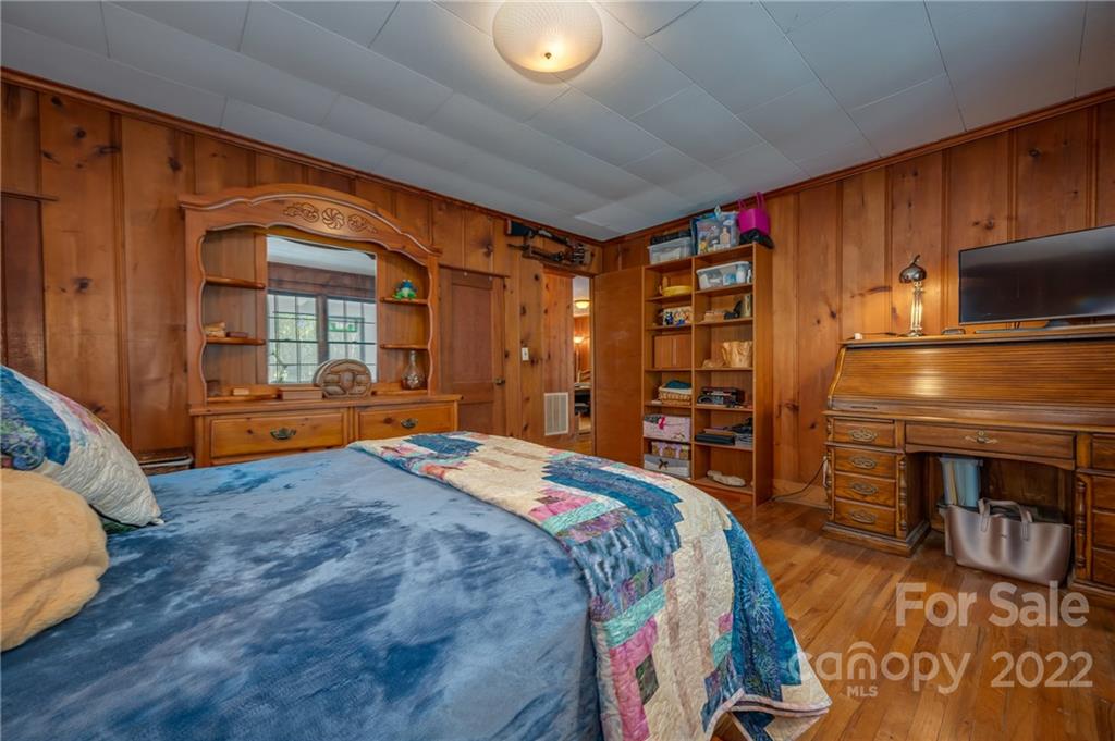 2226 Us Highway Tryon, NC 28782 - Photo 18 of 33 a bed sitting in a room next to a window