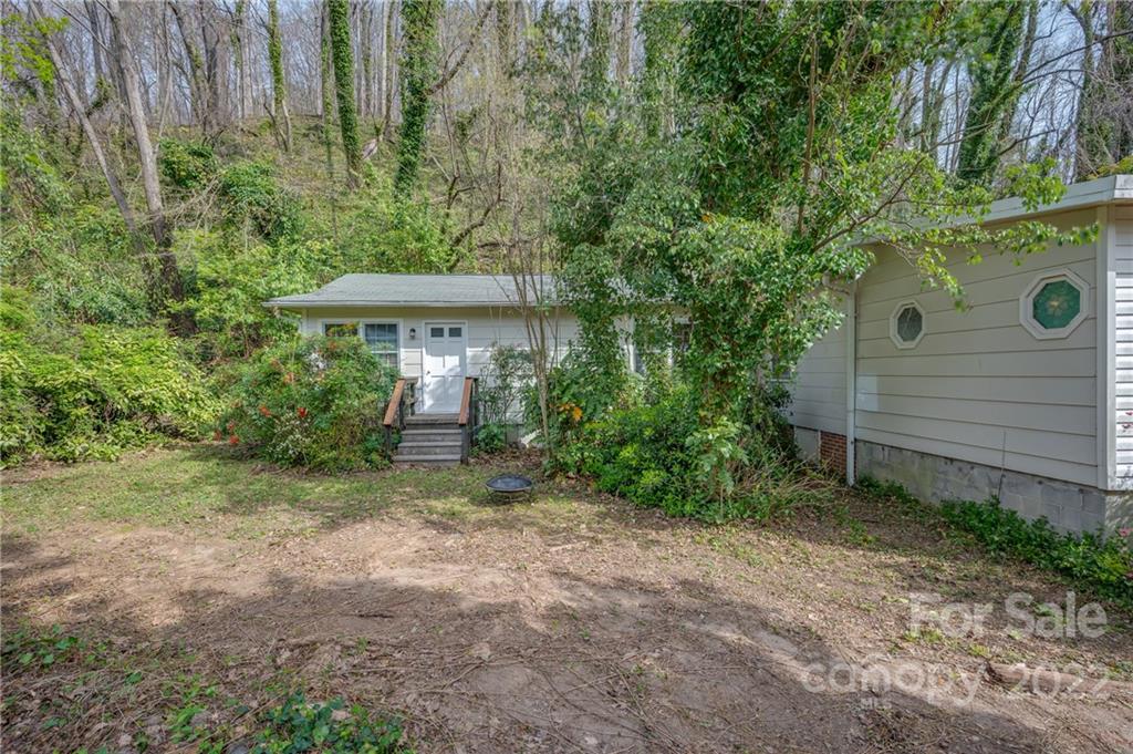 2226 Us Highway Tryon, NC 28782 - Photo 3 of 33 a view of a house with a yard