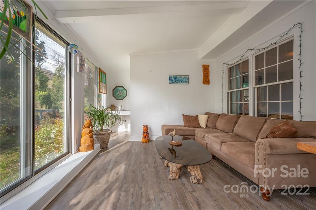 2226 Us Highway Tryon, NC 28782 - Photo 6 of 33 a living room with furniture and a large window