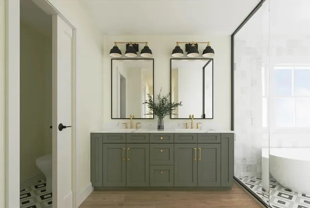 a bathroom with a double vanity sink and a mirror