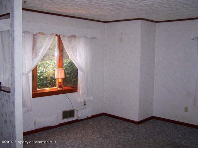 1199 Bendix Road Montrose, PA 18801 - Photo 5 of 7 a view of a small space with a window and a fan