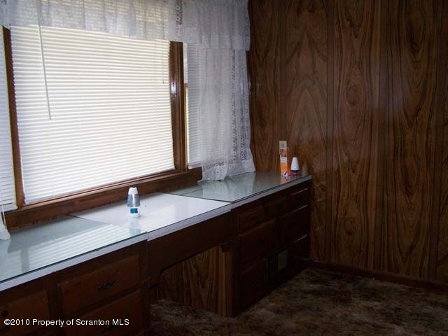 1199 Bendix Road Montrose, PA 18801 - Photo 6 of 7 a bathroom with a sink and a mirror
