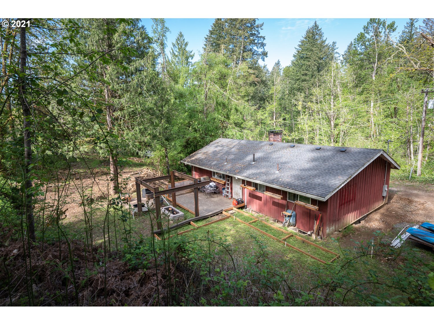 22514 South Redland Road Estacada, OR 97023 - Photo 27 of 28 a backyard of a house with table and chairs