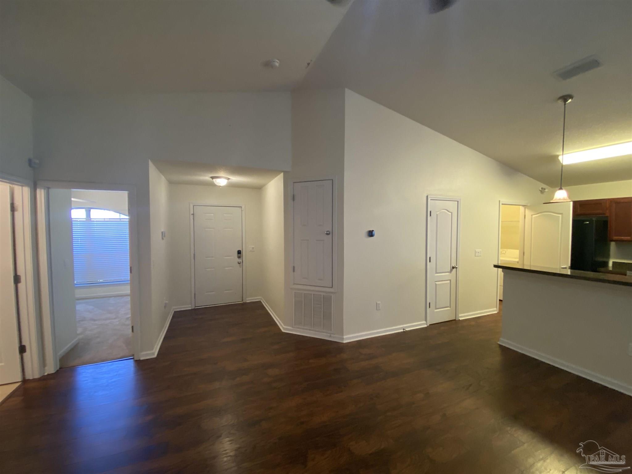 2189 Liberty Loop Road Cantonment, FL 32533 - Photo 23 of 25 a view of a hallway with wooden floor