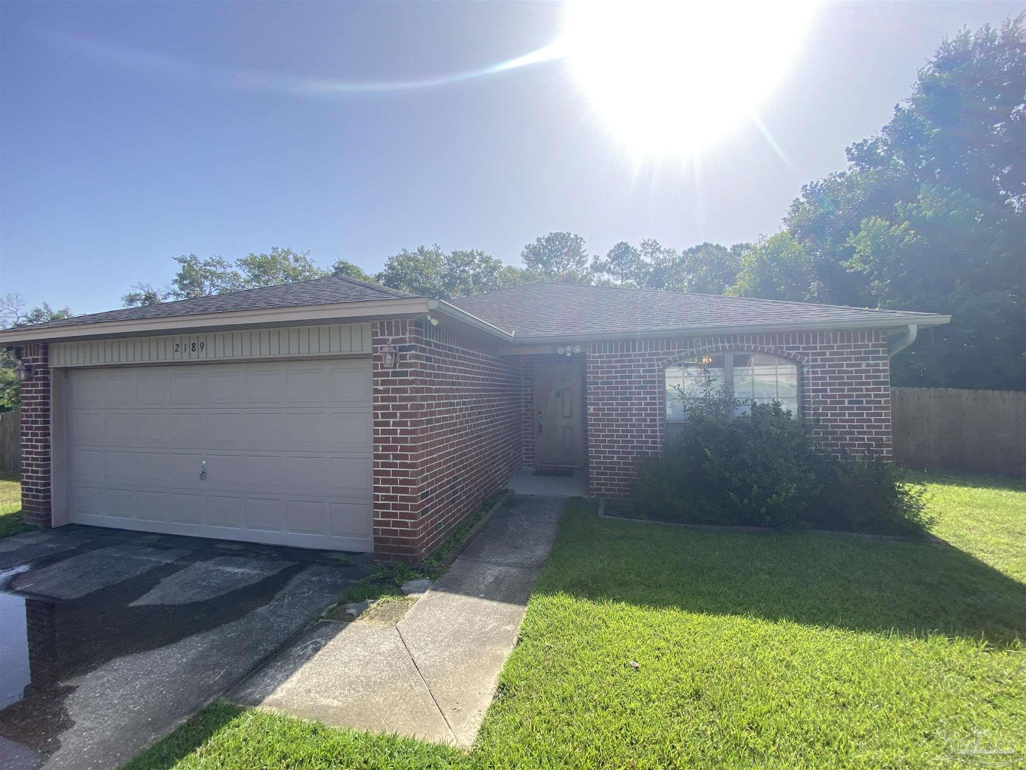 2189 Liberty Loop Road Cantonment, FL 32533 - Photo 3 of 25 a view of a back yard of the house