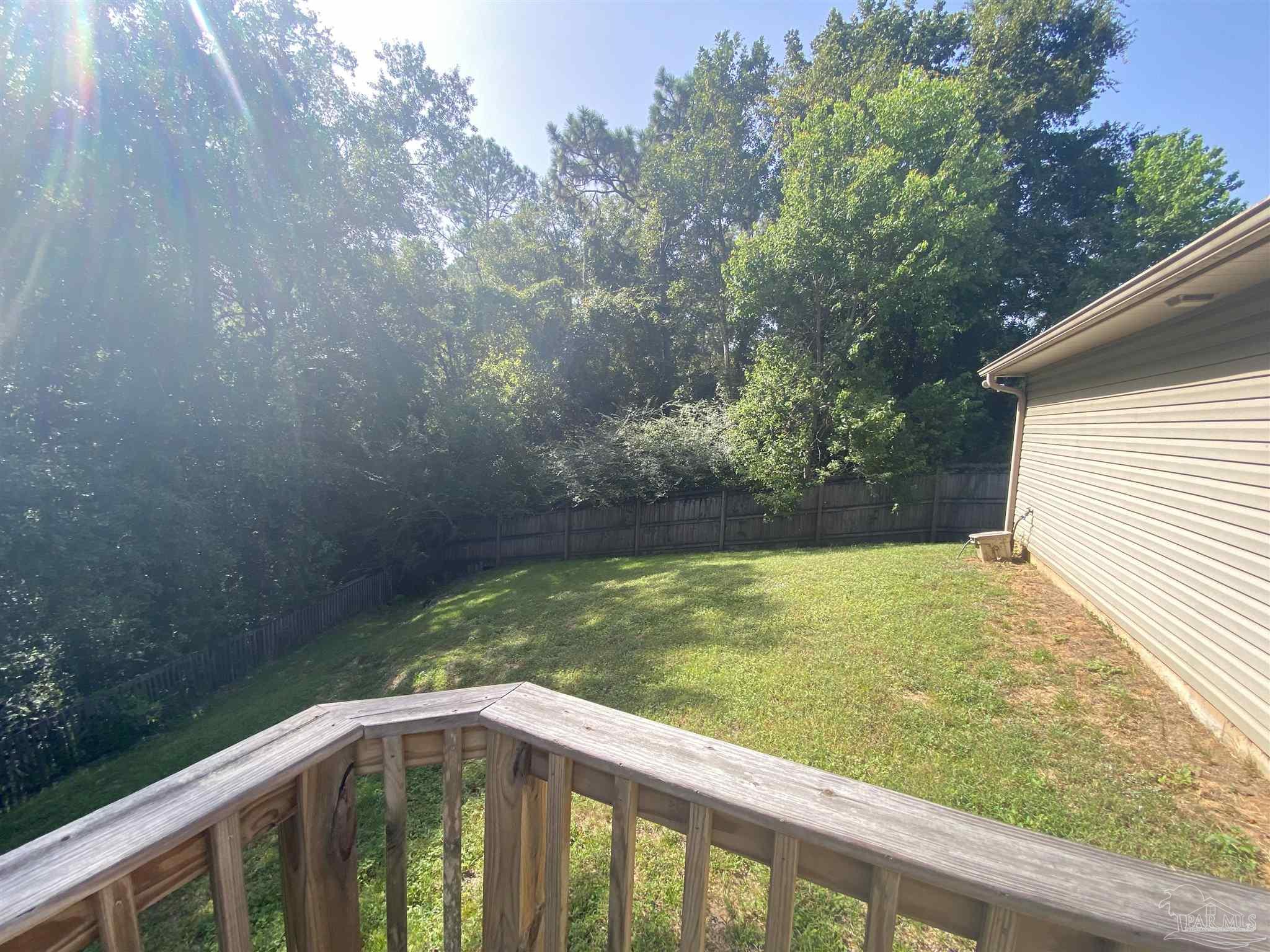 2189 Liberty Loop Road Cantonment, FL 32533 - Photo 4 of 25 a view of a balcony with yard