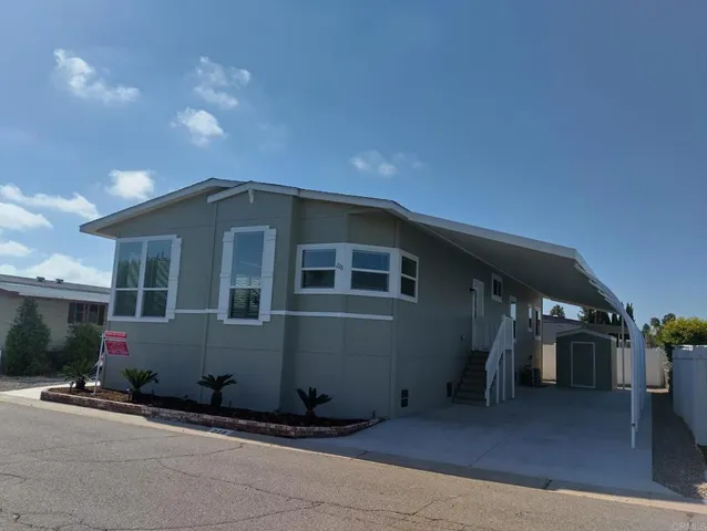 a house with trees in the background