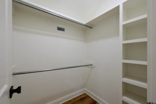 a bathroom with a sink a toilet and bathtub