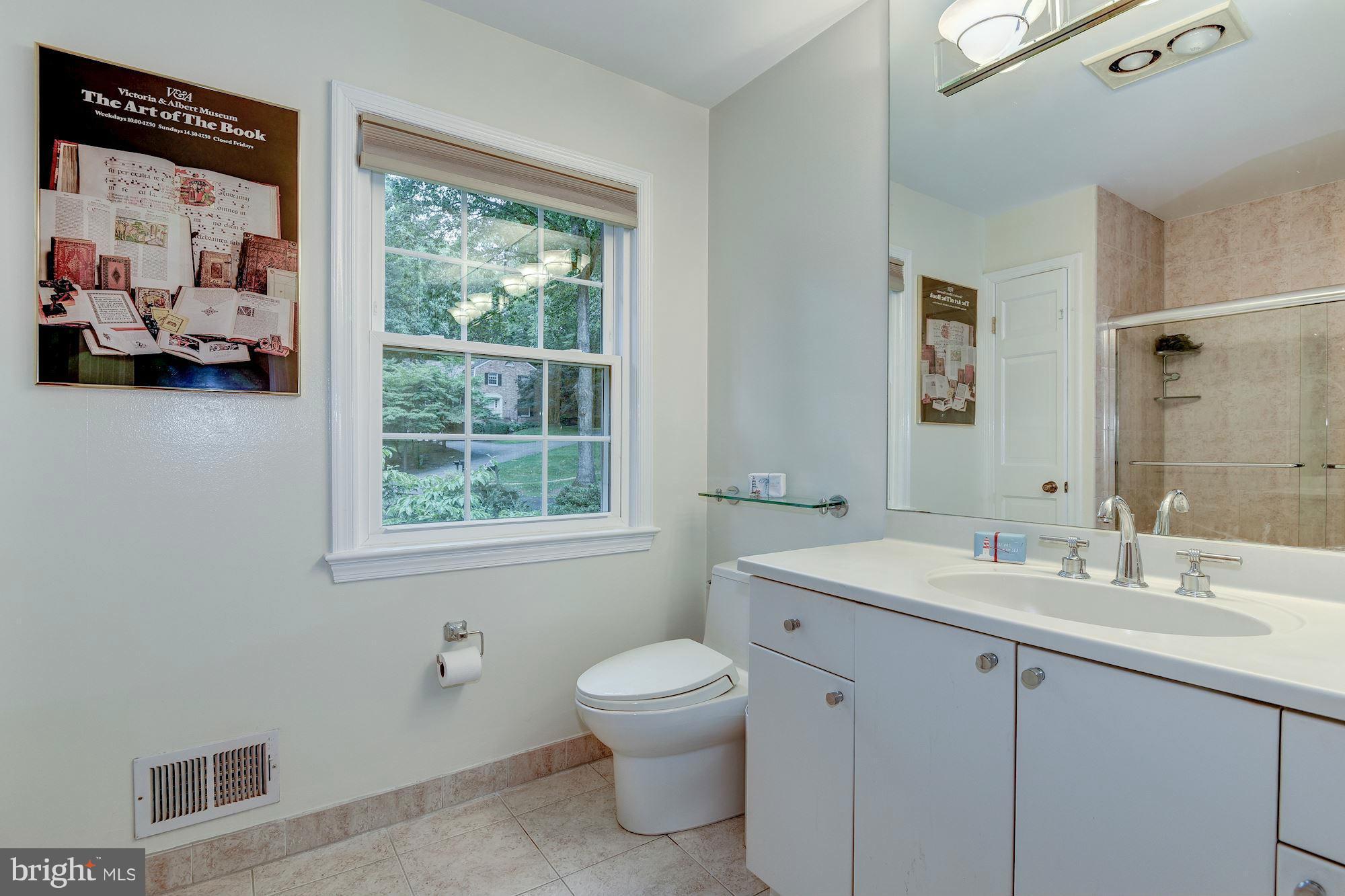 11804 Hunting Ridge Court Potomac, MD 20854 - Photo 21 of 30 Renovated Hall Bathroom