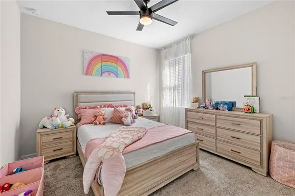 a play room with toys and furniture