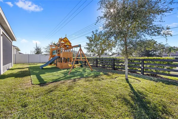 a view of a house with a small yard