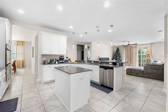 a kitchen with counter top space and appliances