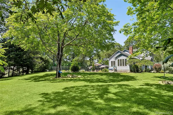 a view of a house with a big yard