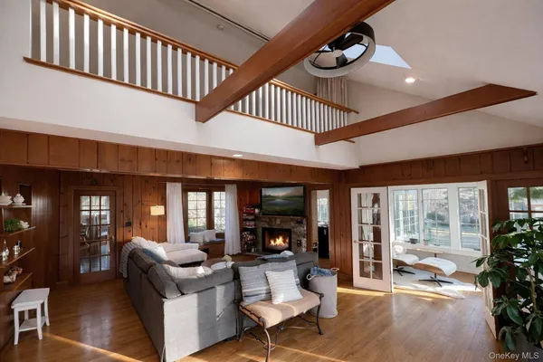 a living room with furniture or outdoor space and a large window