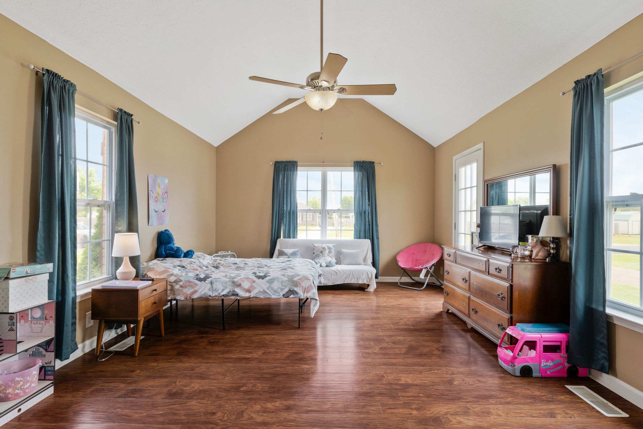 153 Cornerstone Boulevard Portland, TN 37148 - Photo 13 of 30 a bedroom with bed couch and window