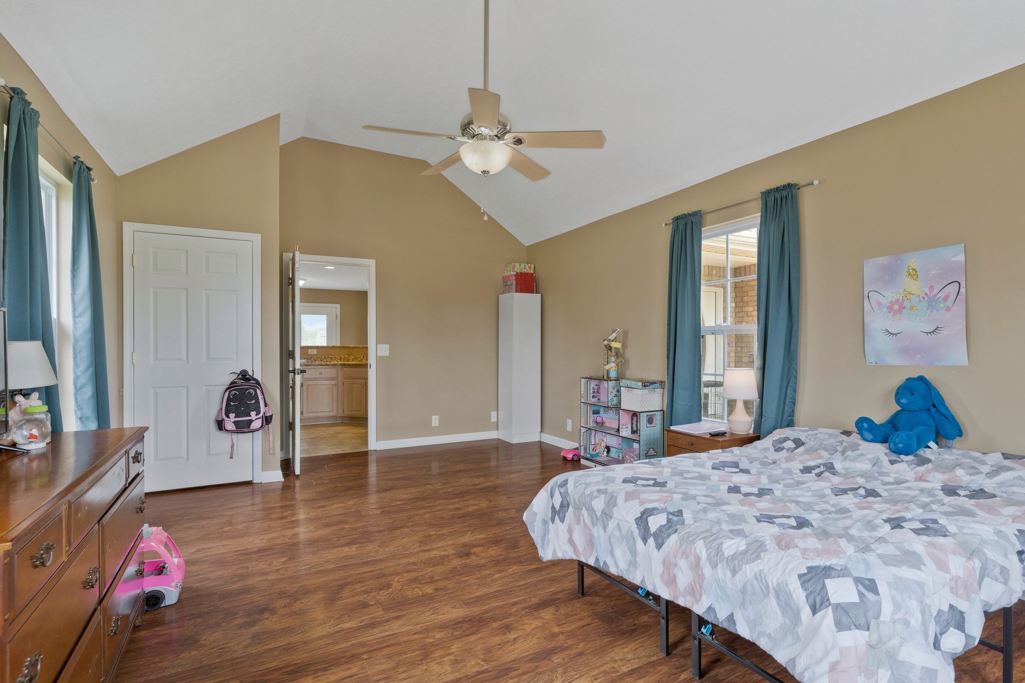 153 Cornerstone Boulevard Portland, TN 37148 - Photo 14 of 30 a bedroom with a bed and wooden floor