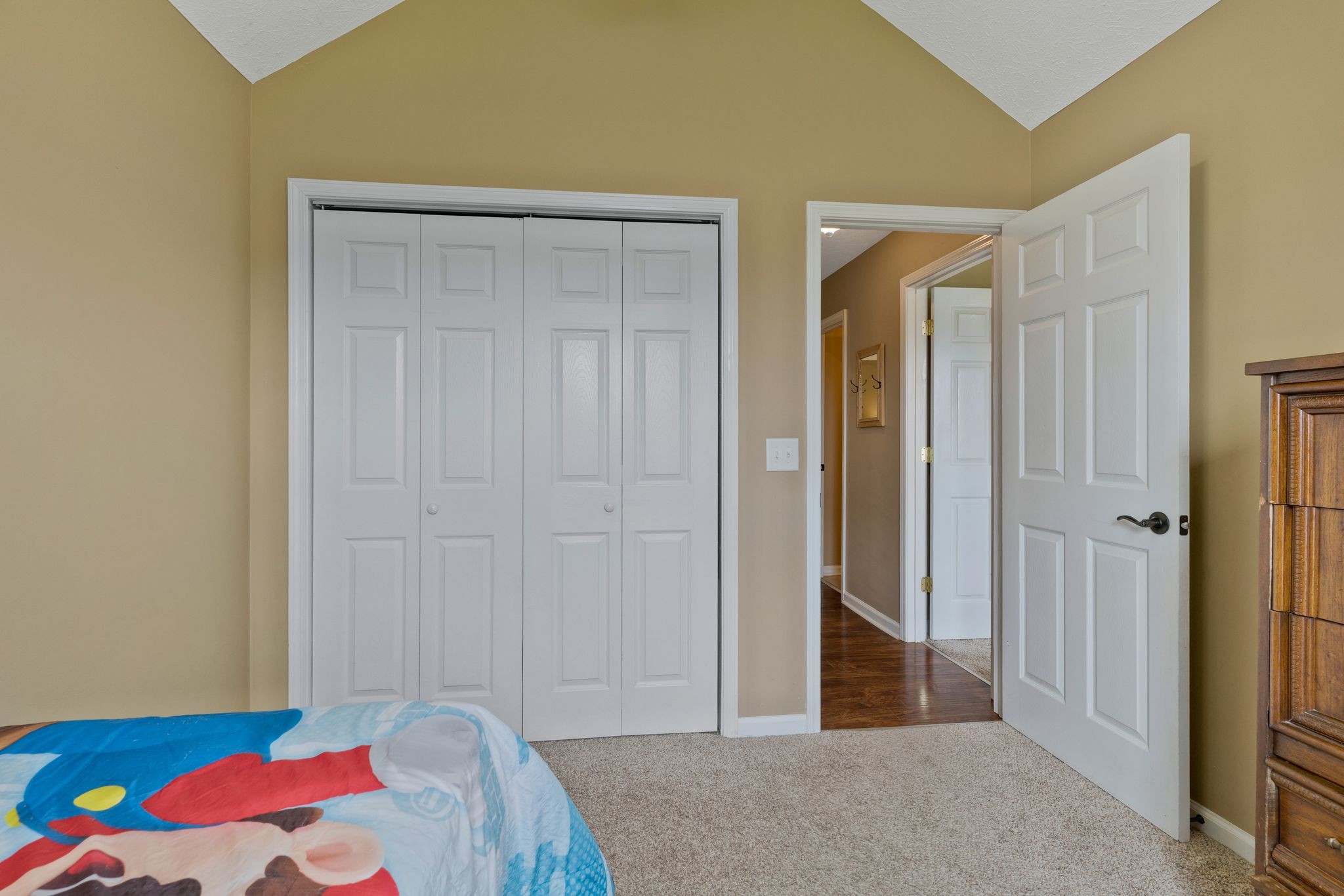 153 Cornerstone Boulevard Portland, TN 37148 - Photo 26 of 30 a bedroom with a bed and a closet