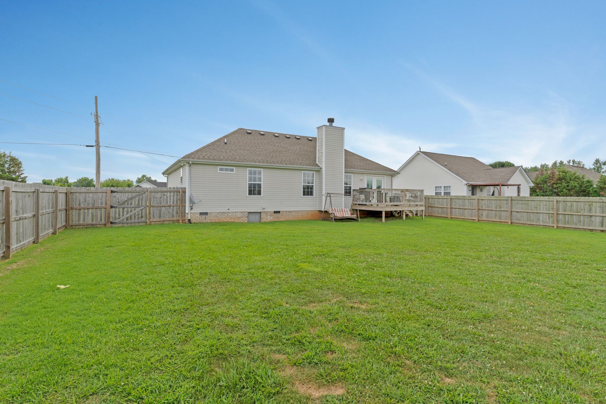 153 Cornerstone Boulevard Portland, TN 37148 - Photo 30 of 30 a view of a house with a yard and sitting area