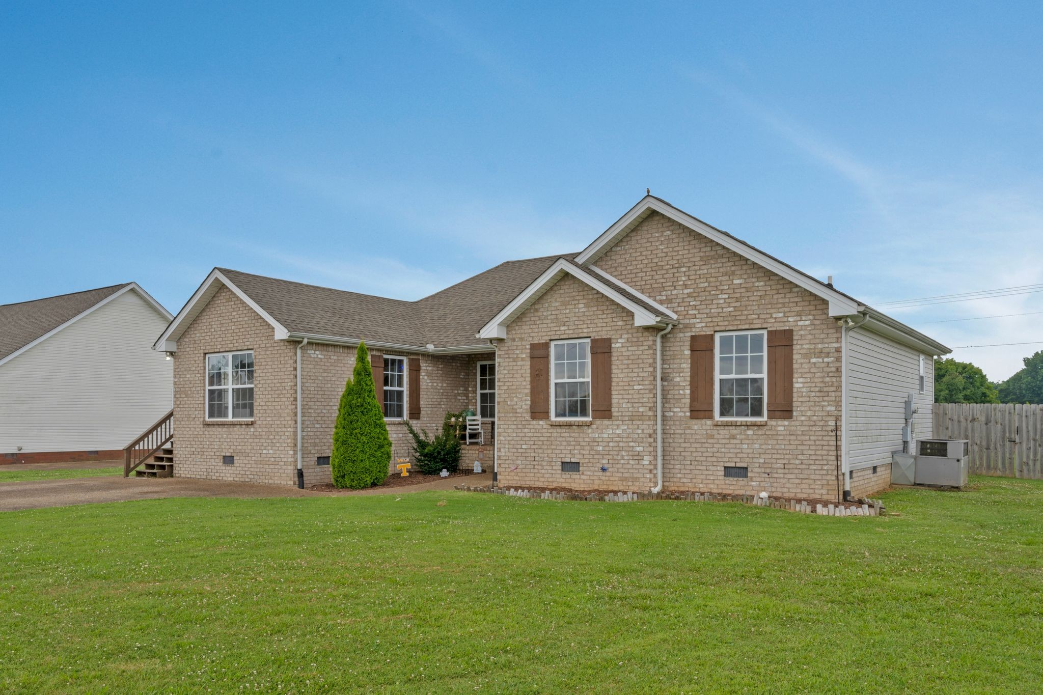 153 Cornerstone Boulevard Portland, TN 37148 - Photo 3 of 30 a front view of house with a garden