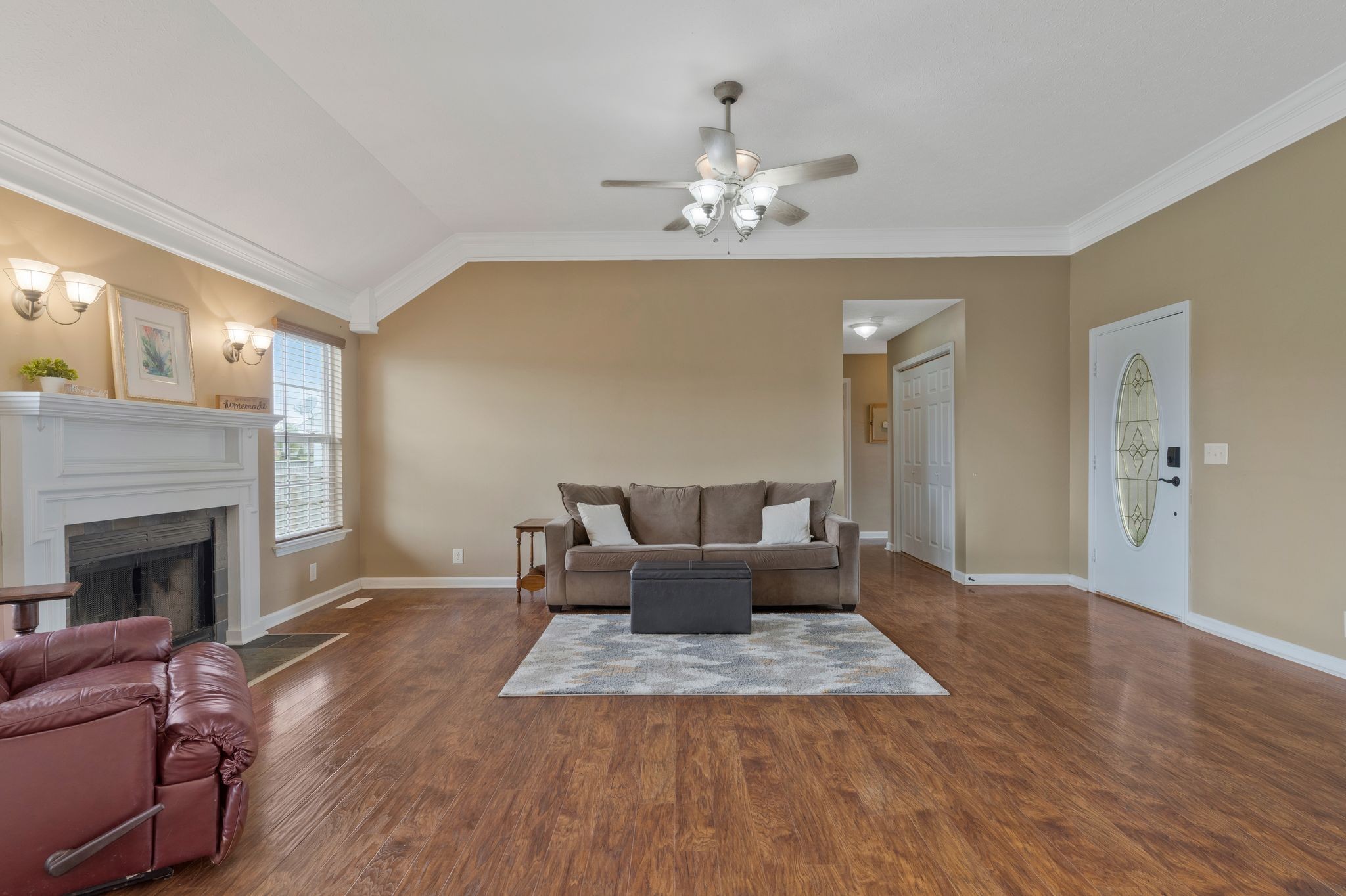 153 Cornerstone Boulevard Portland, TN 37148 - Photo 6 of 30 a living room with furniture and a fireplace