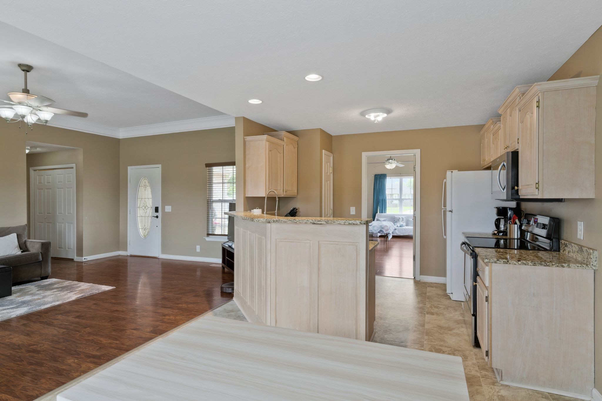 153 Cornerstone Boulevard Portland, TN 37148 - Photo 9 of 30 a view of kitchen with cabinets and wooden floor