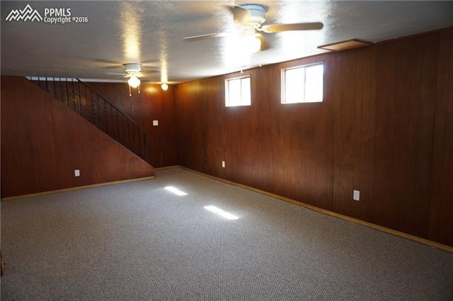 6 North Chelton Road Colorado Springs, CO 80909 - Photo 6 of 30 Basement family room
