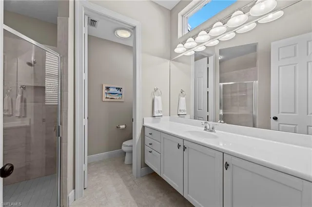 $895,000 | 9230 Troon Lakes Drive, Naples, FL 34109