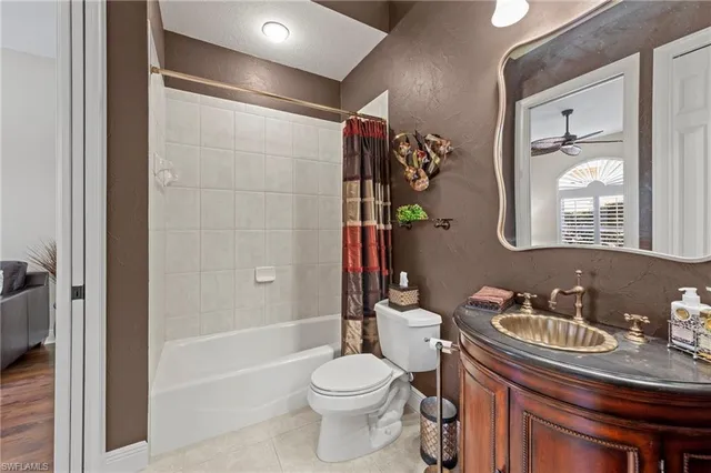 $895,000 | 9230 Troon Lakes Drive, Naples, FL 34109