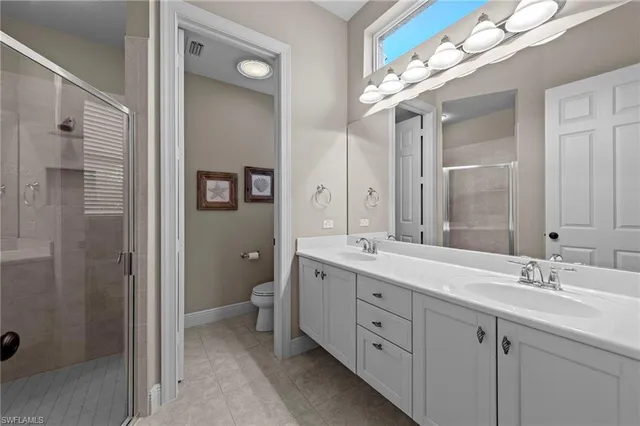 $895,000 | 9230 Troon Lakes Drive, Naples, FL 34109