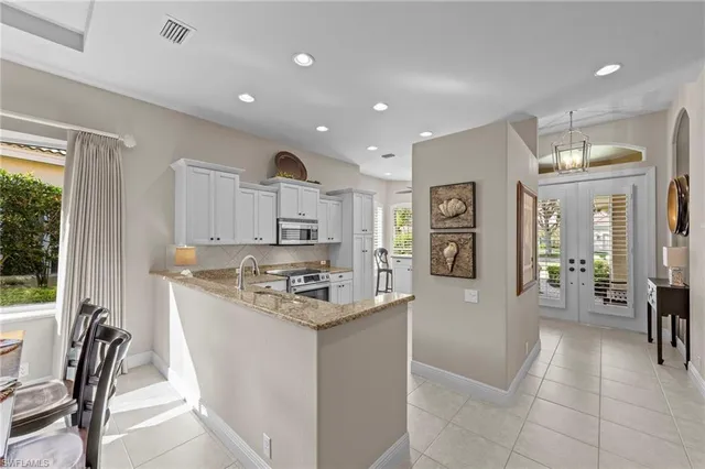 $895,000 | 9230 Troon Lakes Drive, Naples, FL 34109