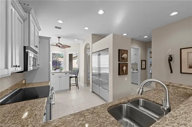 $895,000 | 9230 Troon Lakes Drive, Naples, FL 34109