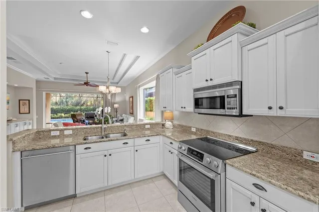 $895,000 | 9230 Troon Lakes Drive, Naples, FL 34109