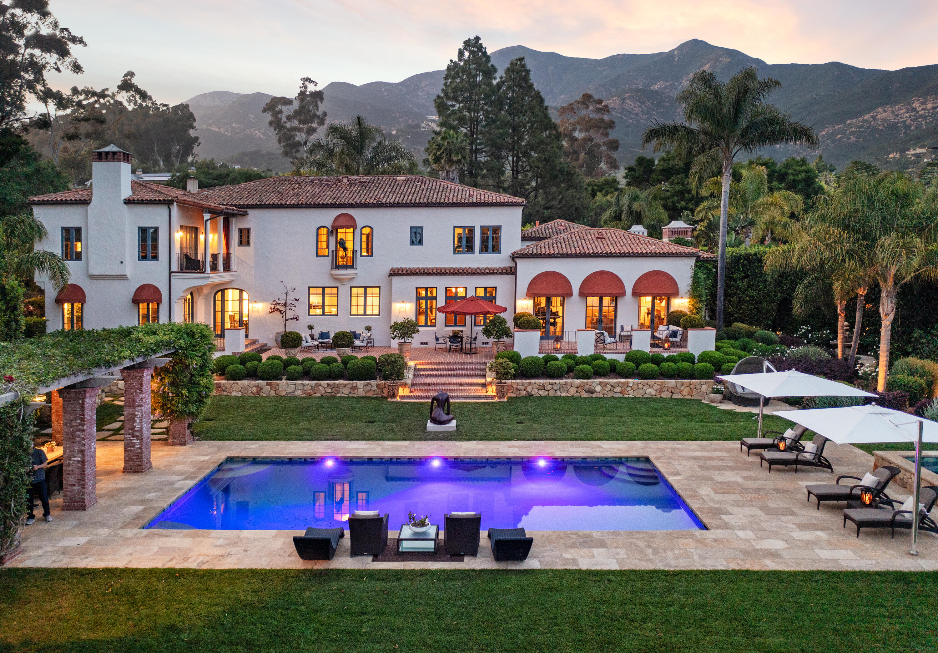 a view of yard with swimming pool and outdoor seating