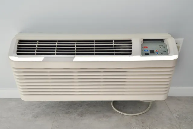 a view of a utility room with washing machine and a sink